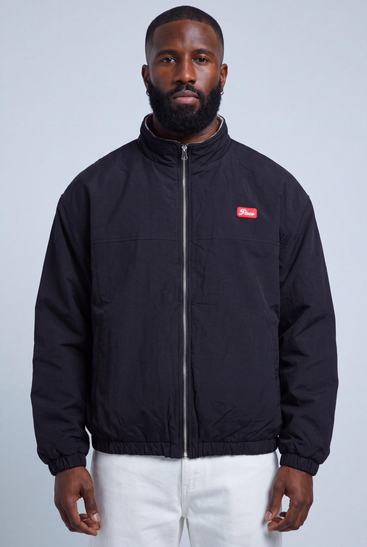Aspen Reversible Jacket — black nylon side