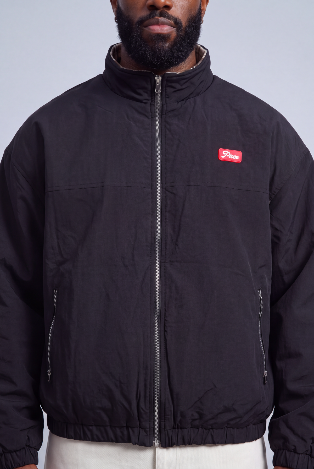 Aspen Reversible Jacket — black nylon side