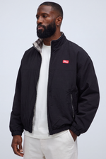 Aspen Reversible Jacket — black nylon side