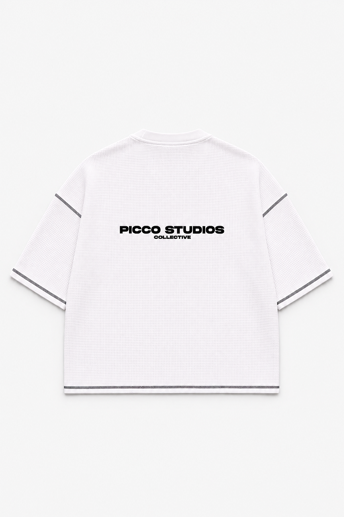 Back of the white Picco Waffle Tee with black embroidered Picco Studios Collective logo and contrast stitching